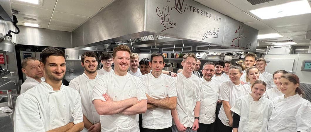 Harry Keen at the Waterside Inn flanked by chef patron Alain Roux and head chef Fabrice Uhryn.