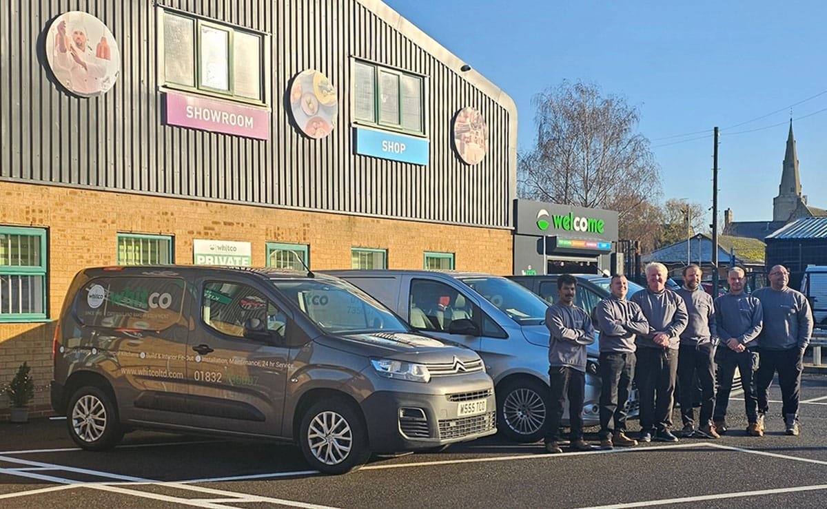 WhitCo aftersales team group photo outside the showroom