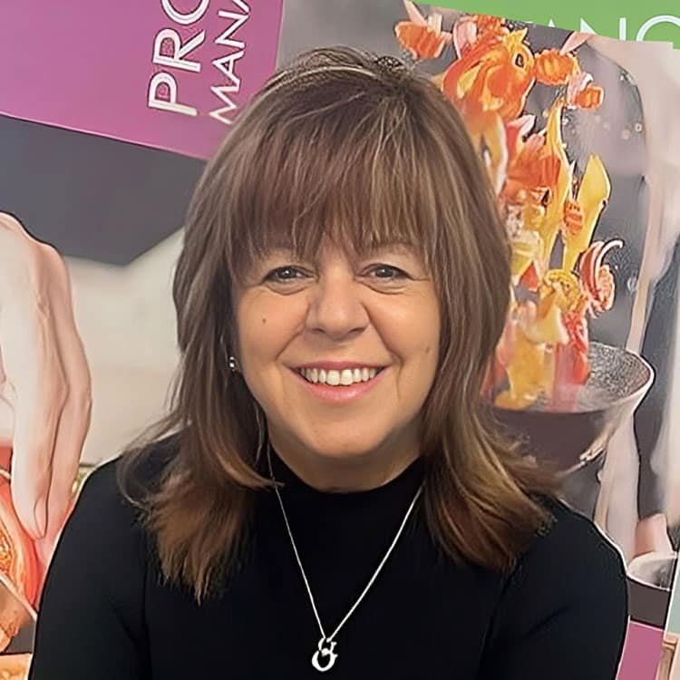 WhitCo team member Carmela Webb, Director